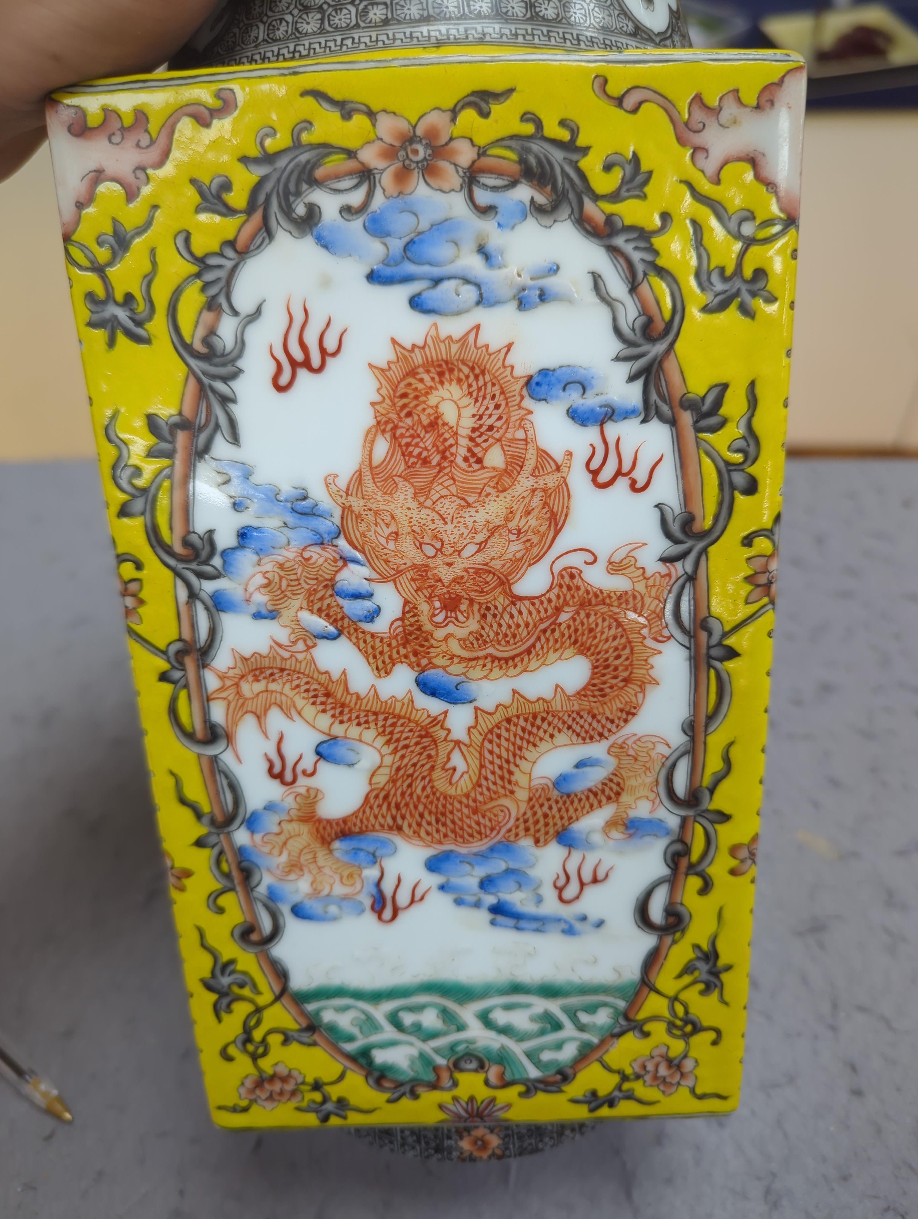 A Chinese enamelled porcelain cong-shaped vase, decorated with dragons chasing the flaming pearl, 29cm high